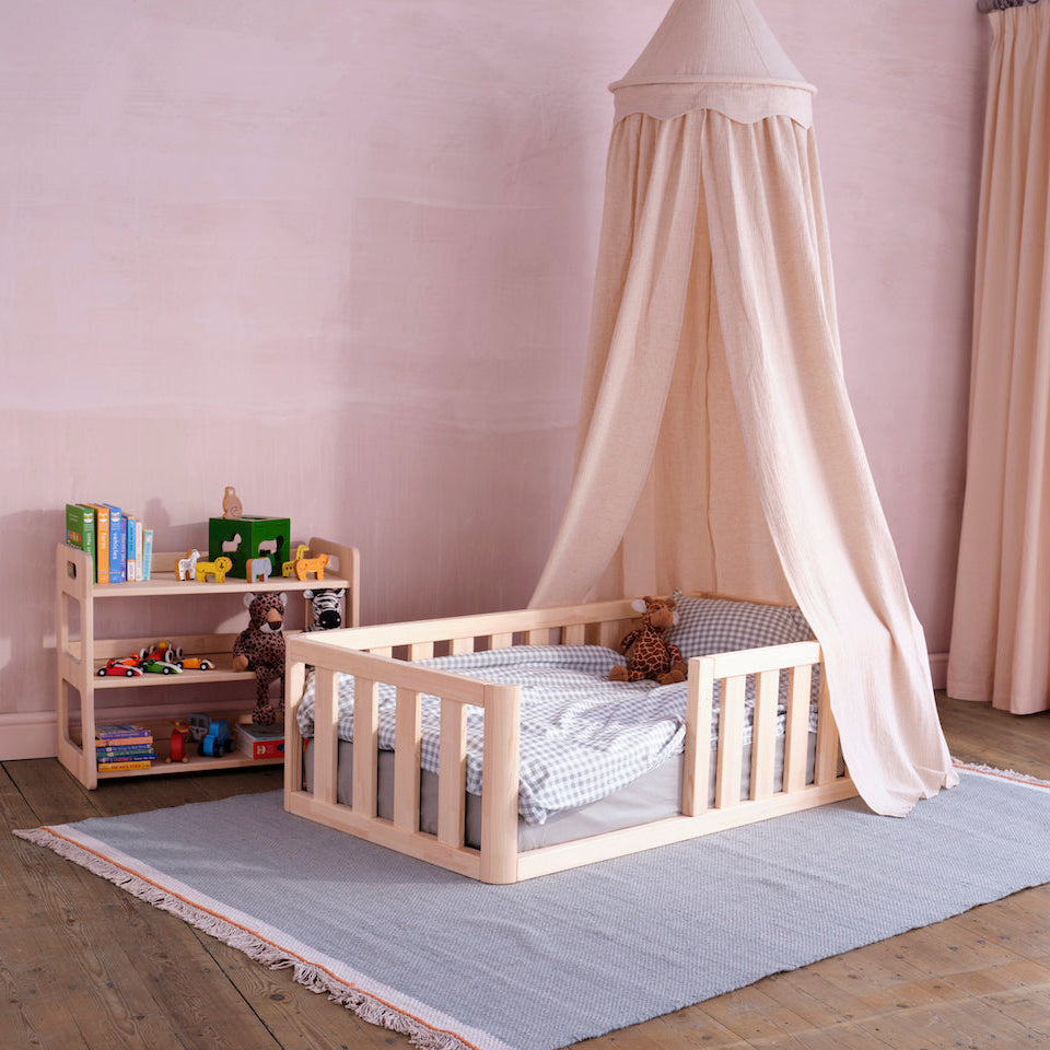 Princess tent styled toddler bed by Roomix combining fun design with safe, low-to-floor sleeping