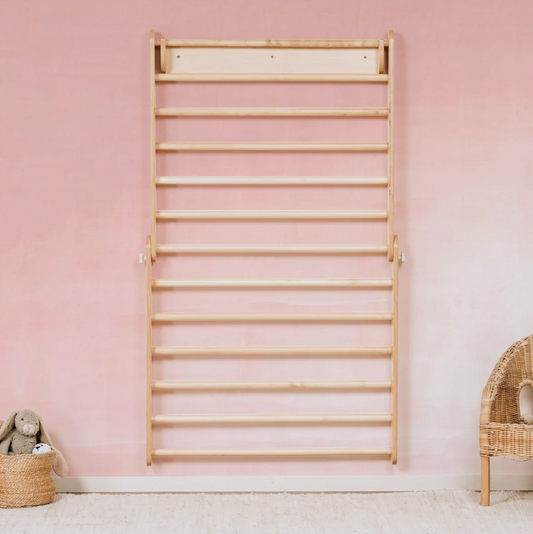 toddler climbing out of cot
