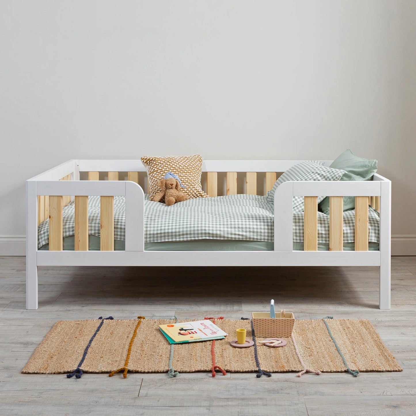What is a Montessori bed and how is it different from a regular toddler bed?