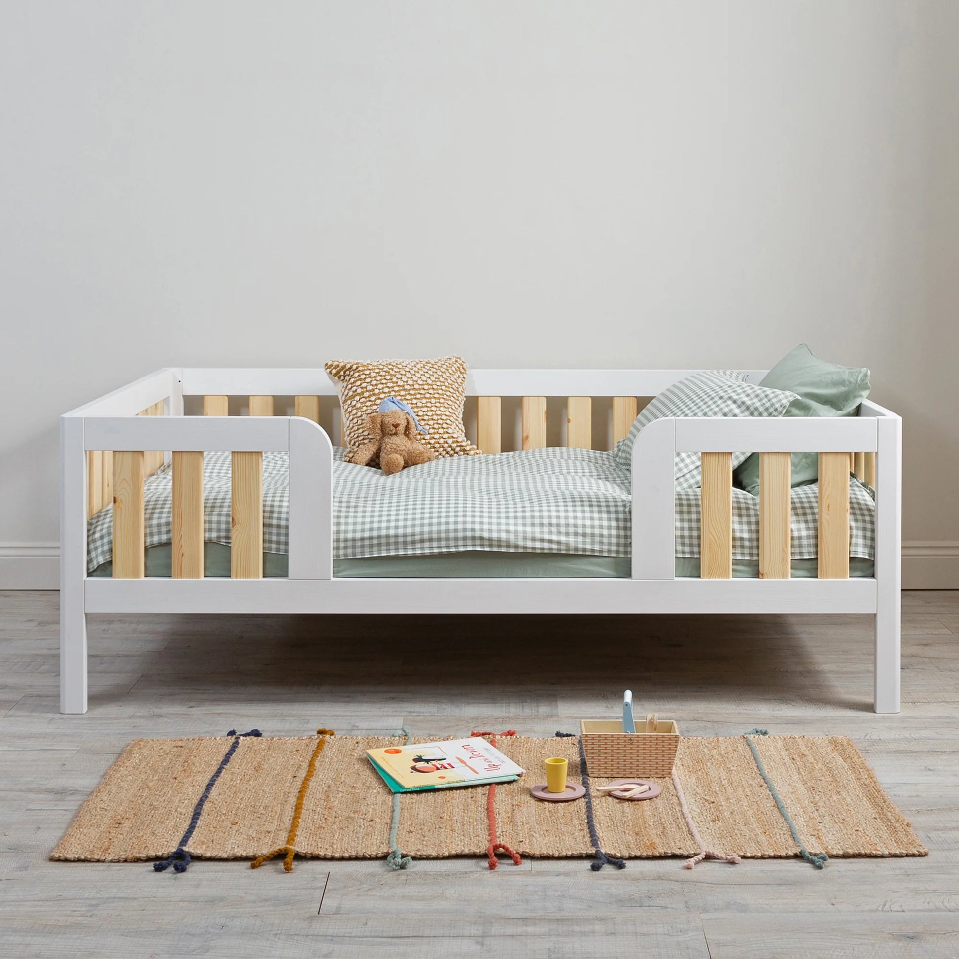 What is a Montessori bed and how is it different from a regular toddler bed?