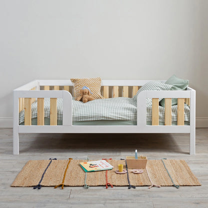 What is a Montessori bed and how is it different from a regular toddler bed?